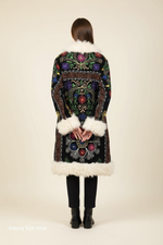 Load image into Gallery viewer, Model wearing The Sina-e-Safid Afghan coat - back view