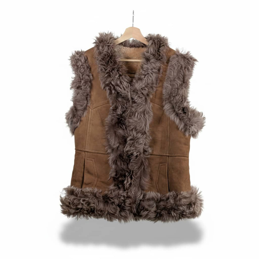 Brown suede vest with fur trim on a hanger against a white background