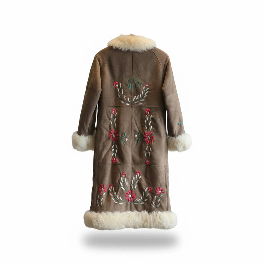 Brown coat with floral embroidery and white fur trim on a white background