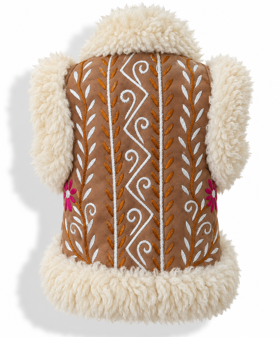 Back view of a brown faux-shearling vest with cream sherpa trim, featuring white and orange embroidered geometric and leaf patterns and small pink flowers on the front.