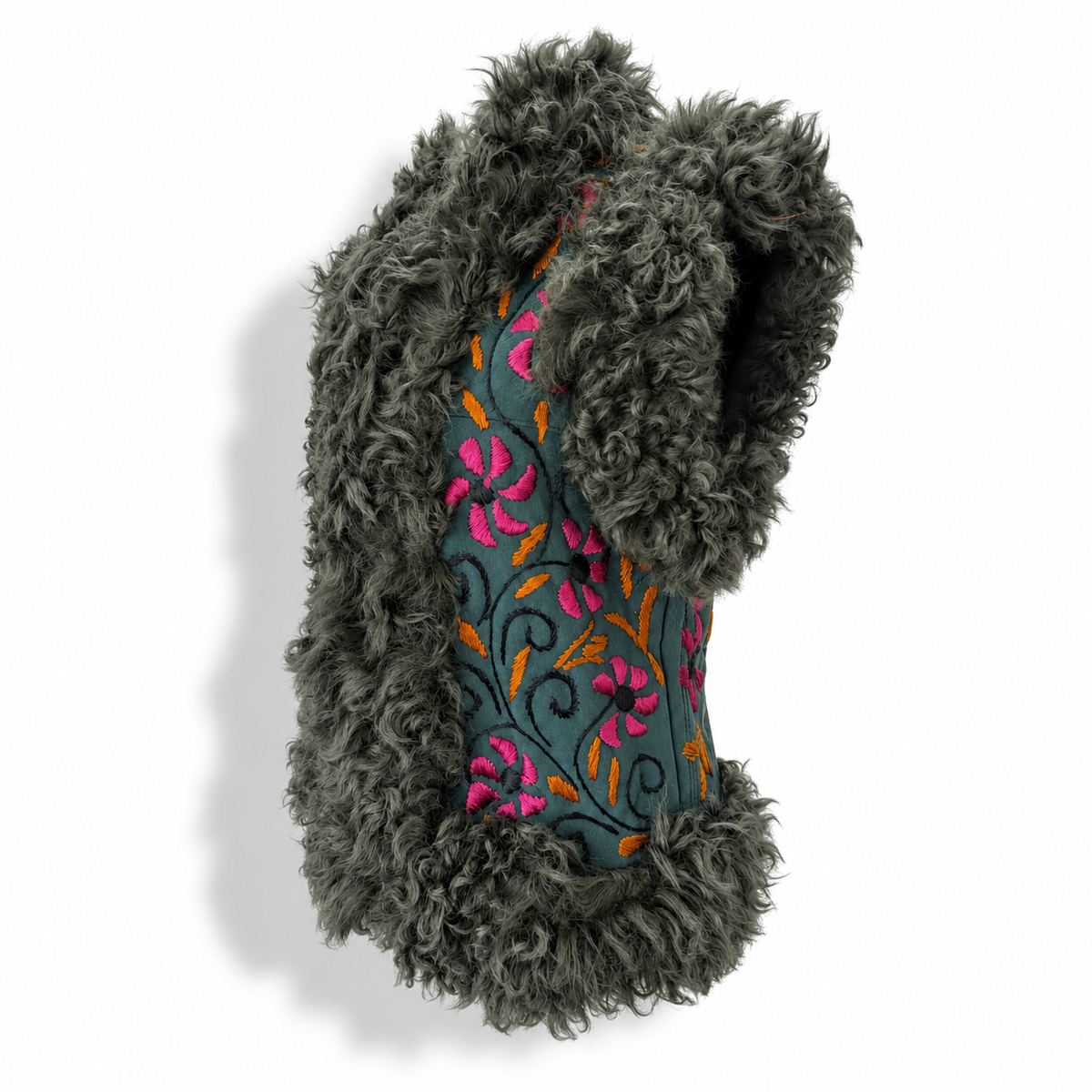 A dark gray curly faux-shearling vest with a colorful embroidered floral panel in pink, orange, and teal, shown on a white background.
